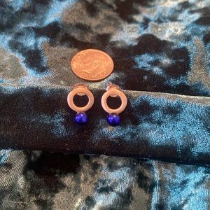 Sterling silver hoops with bright blue accent